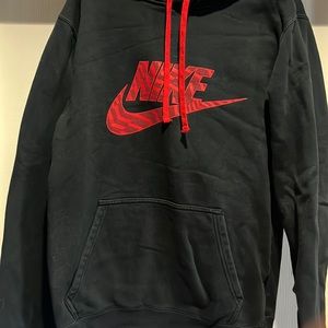Red and black Nike hooded sweatshirt